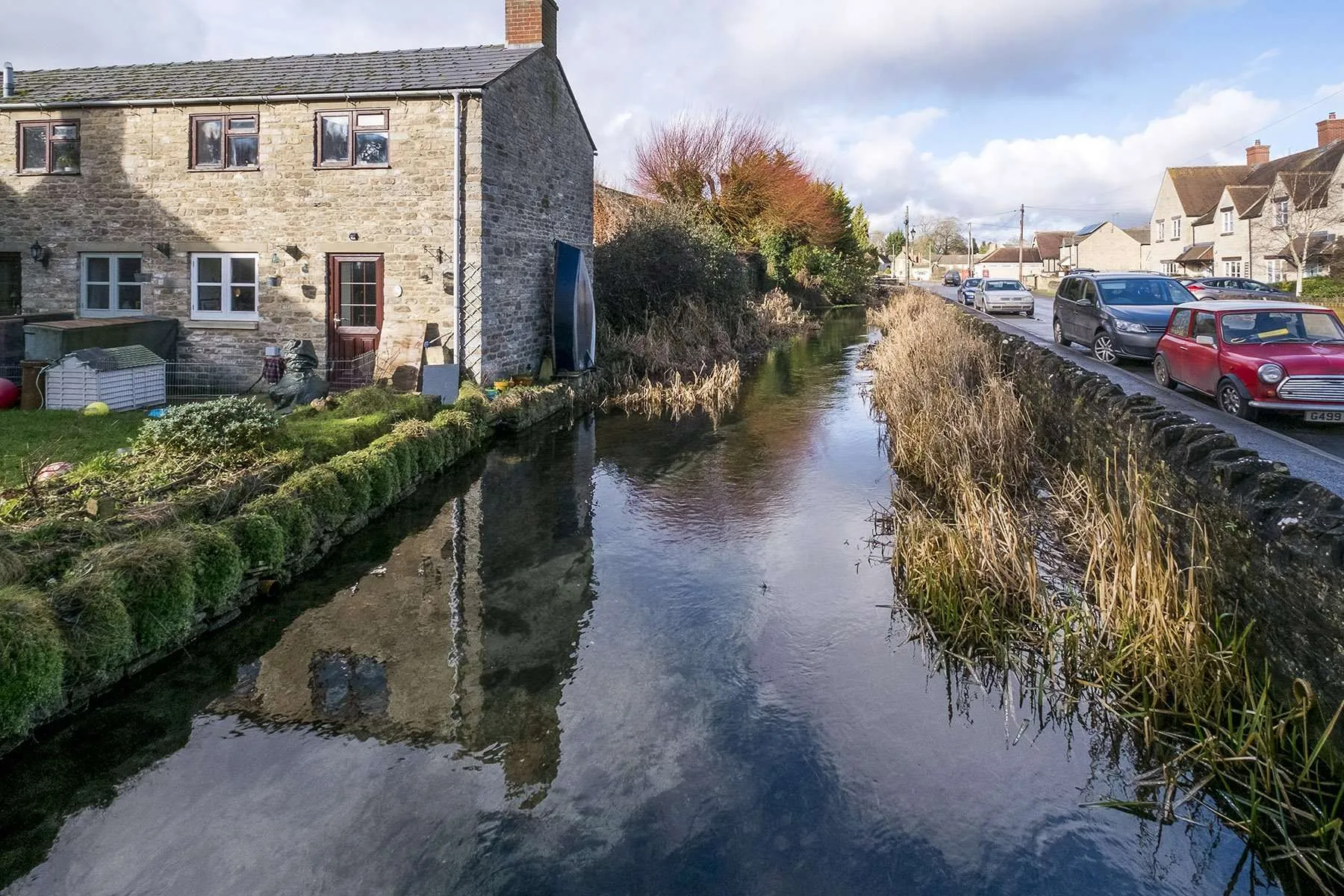 Ashton Keynes village. This is the first village which the River Thames flows through.