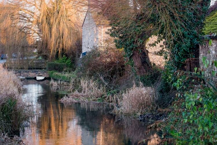 Ashton Keynes village. This is the first village which the River Thames flows through.