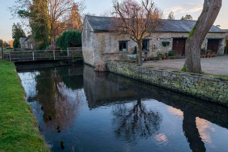 Ashton Keynes village. This is the first village which the River Thames flows through.