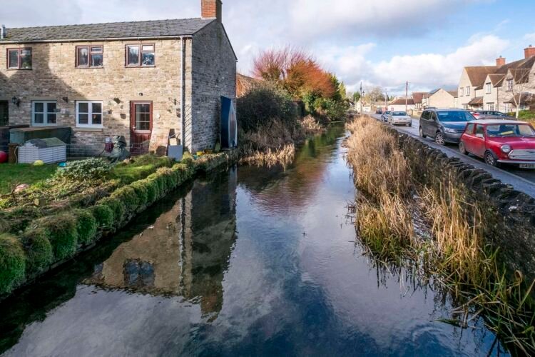 Ashton Keynes village. This is the first village which the River Thames flows through.