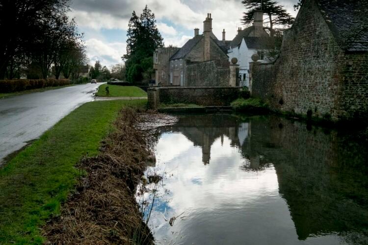 Ashton Keynes village. This is the first village which the River Thames flows through.